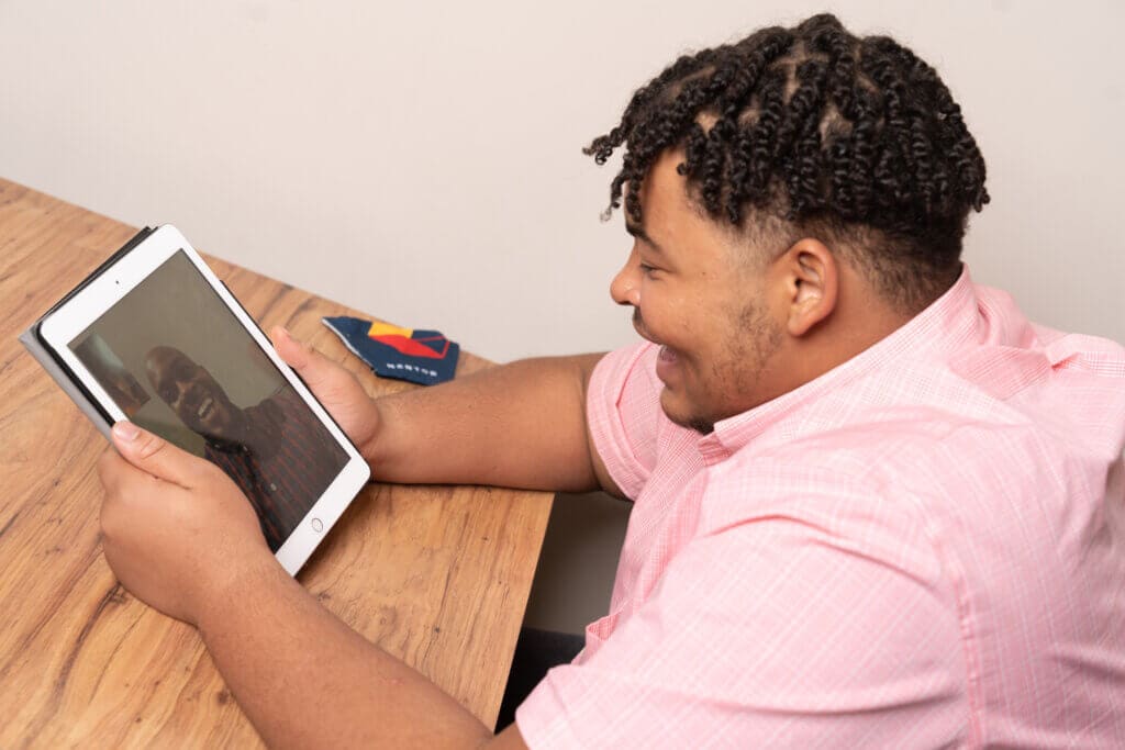 Mentee video chatting with someone